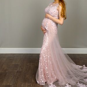Custom made. Not a maternity dress but can be worn as one.